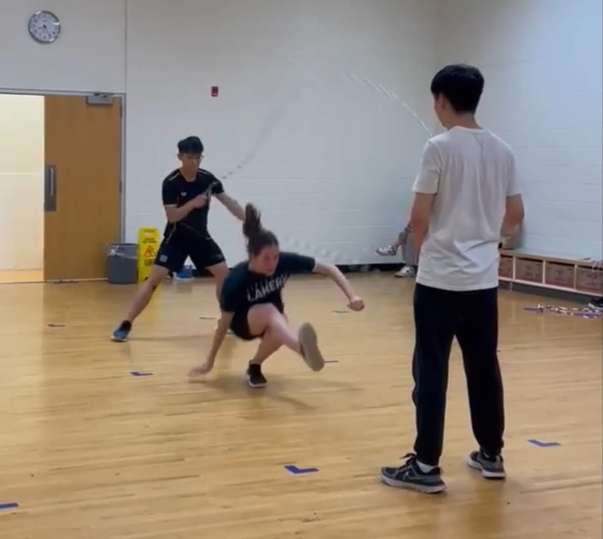 Three members of the Jump Rope Club skipping rope